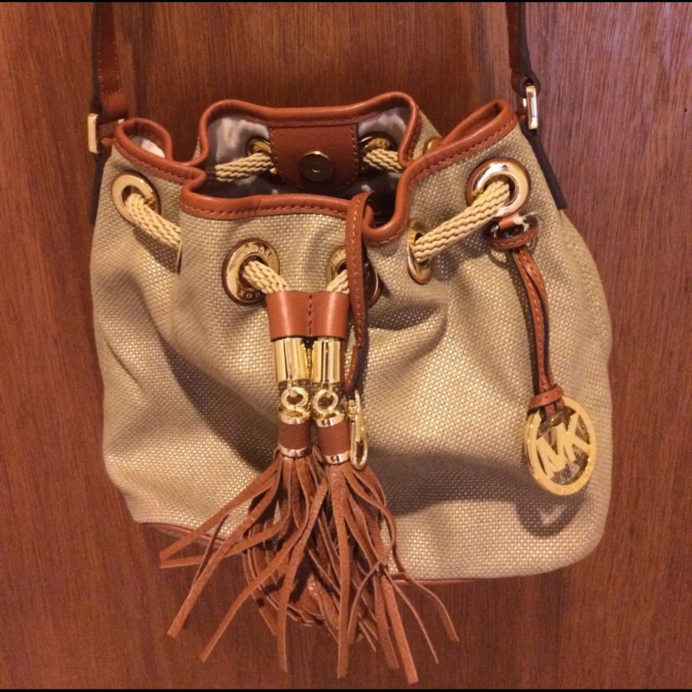 Michael Kors gold bucket bag