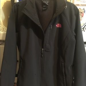 Black North Face with pink logo.