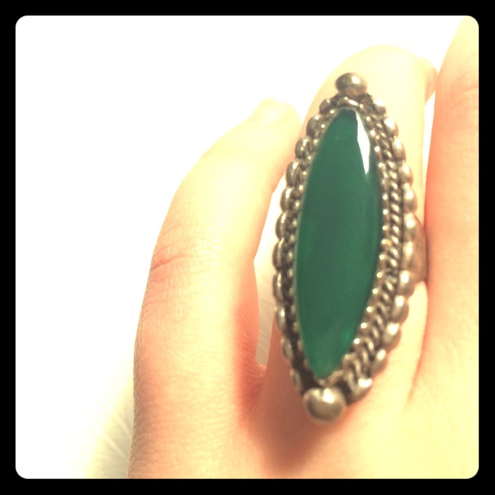 Emerald colored stone long ring