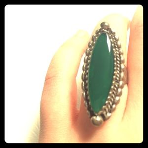 Emerald colored stone long ring