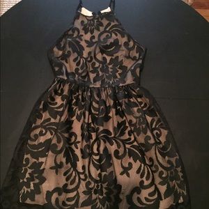 Fit and flare black halter dress