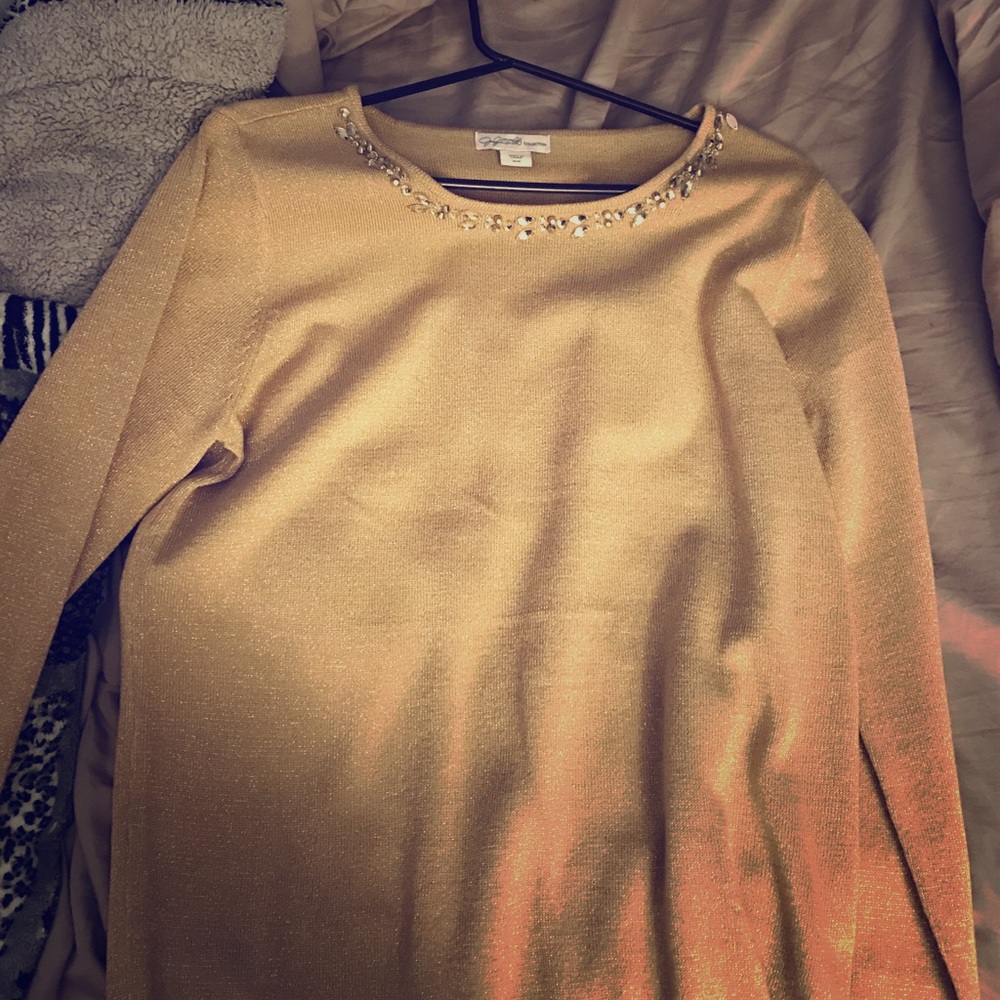 Sweater from Macy's. Never worn.  No tags