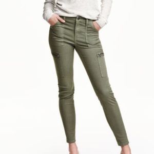 Green skinny cargo pants with zippers @ ankle