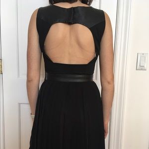 Black H&M Dress with Open Back and Pleated Skirt