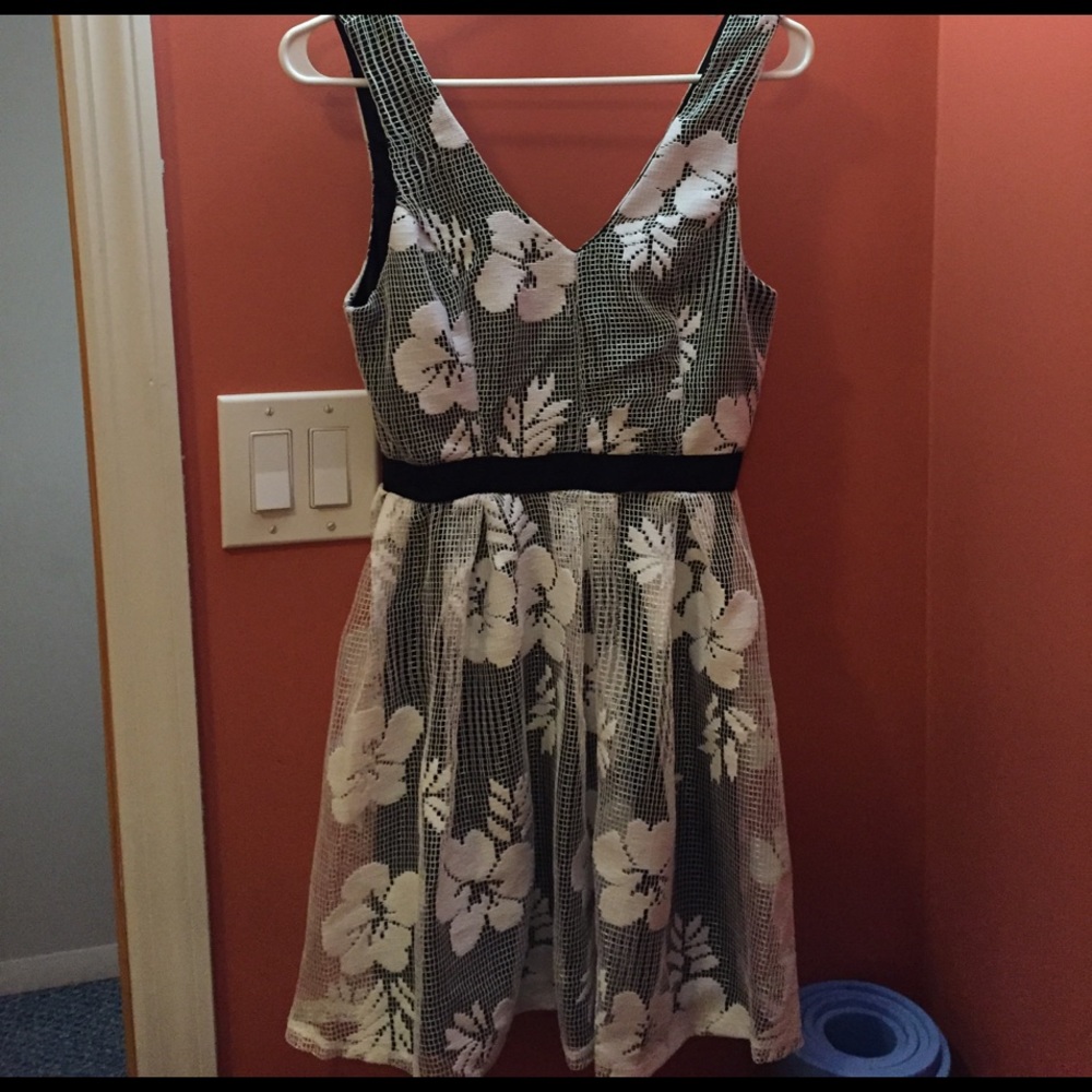 Cream and black colored dress