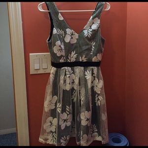 Cream and black colored dress