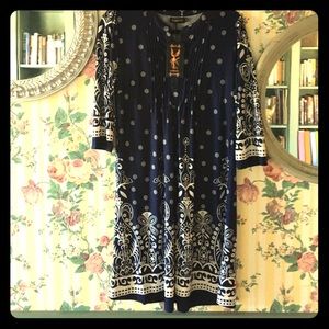 Reborn dress size medium but runs large. NWT