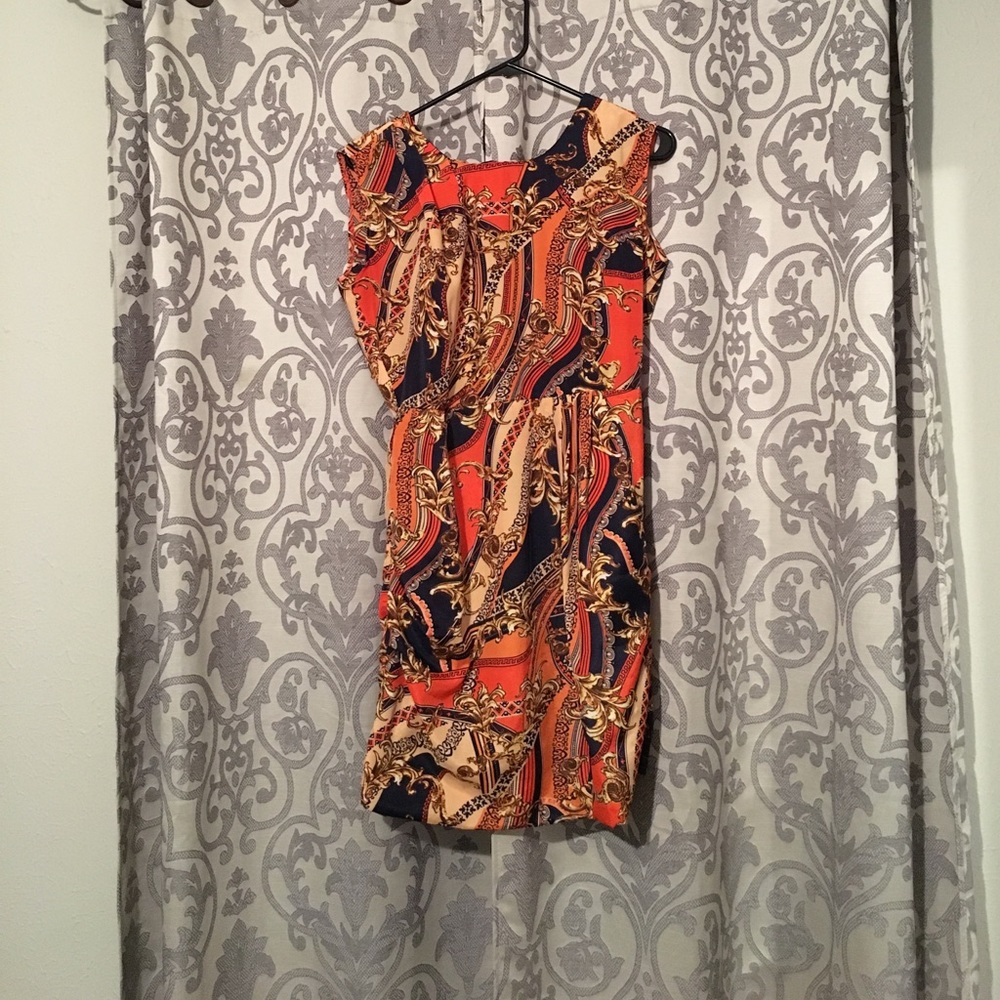 Gorgeous orange and blue sheath dress! Very classy