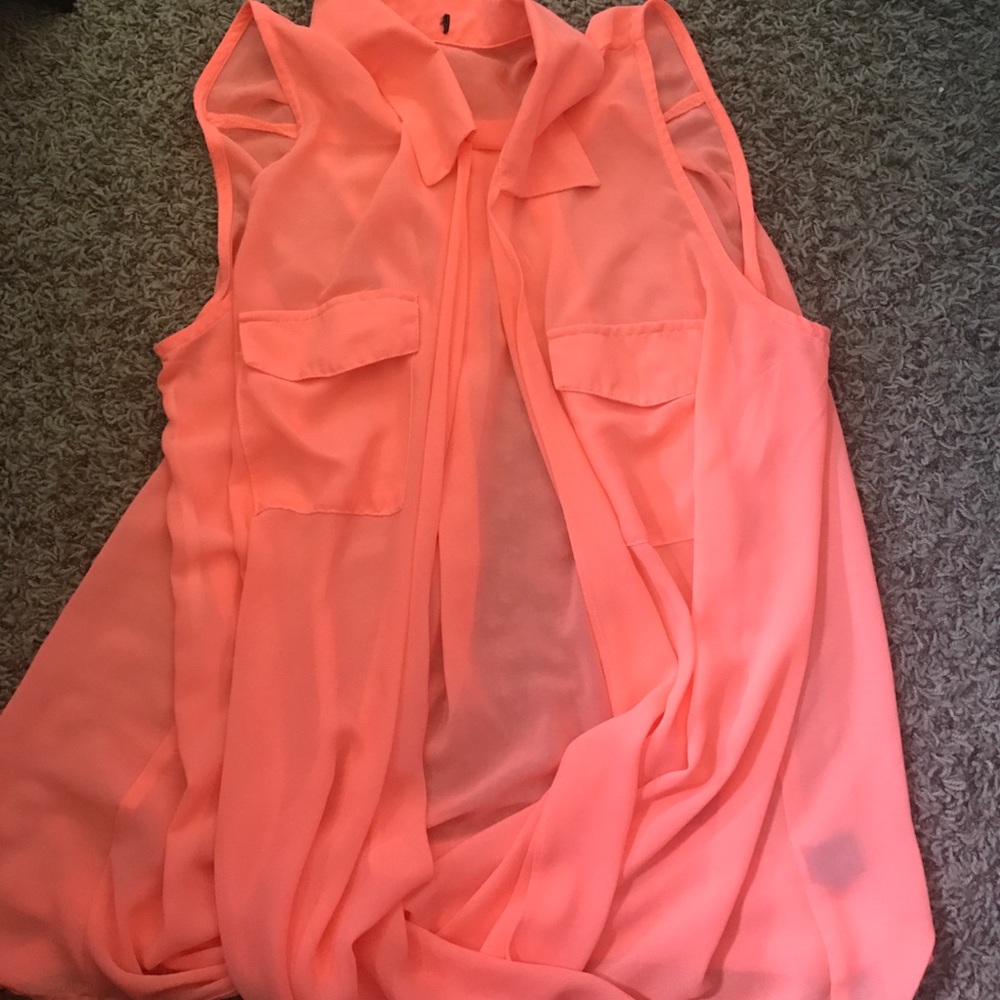 Pink sleeveless blouse