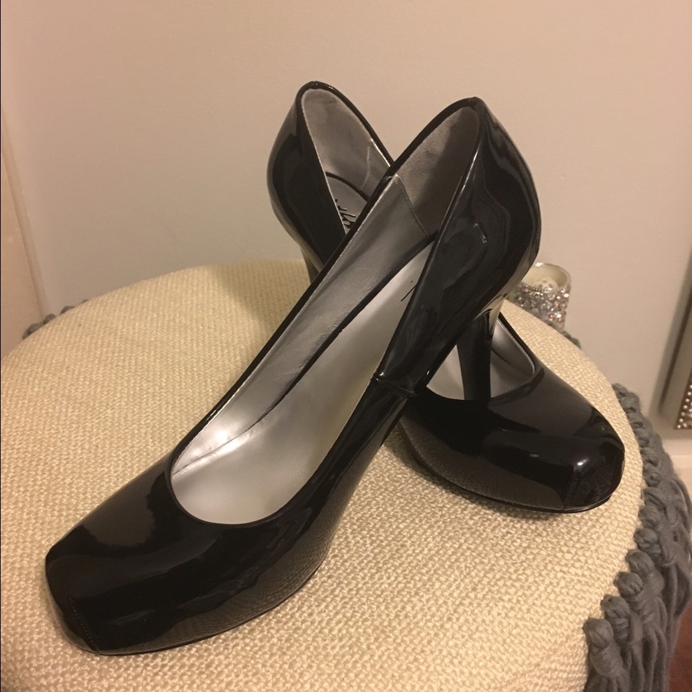 Black Mosinno Heels with platform.