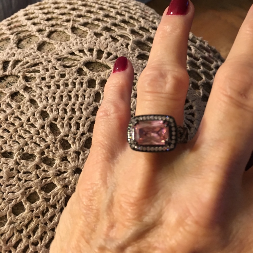 Pink ring in black setting