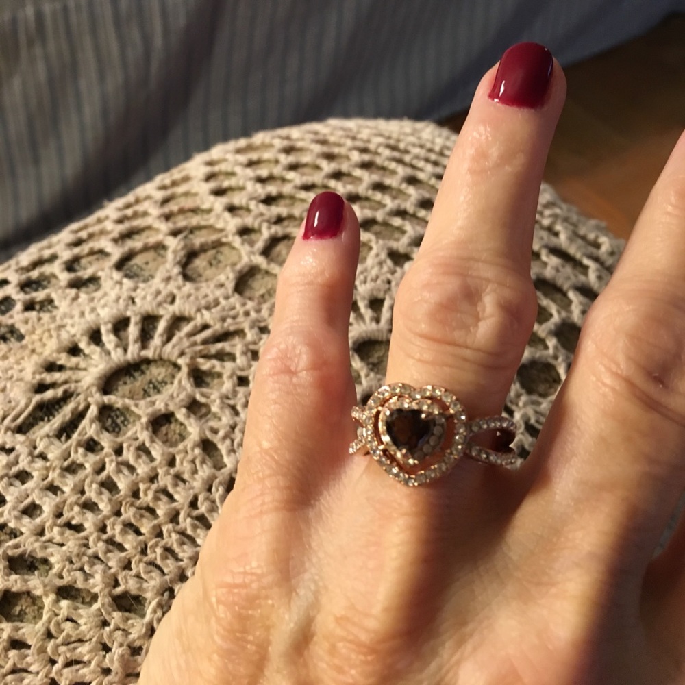 Purple ring in gold setting with rhinestones