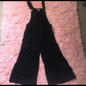 Black jumpsuit, cropped wide leg. Never worn!