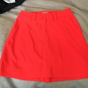 Red Nike golf skirt with built in shorts.