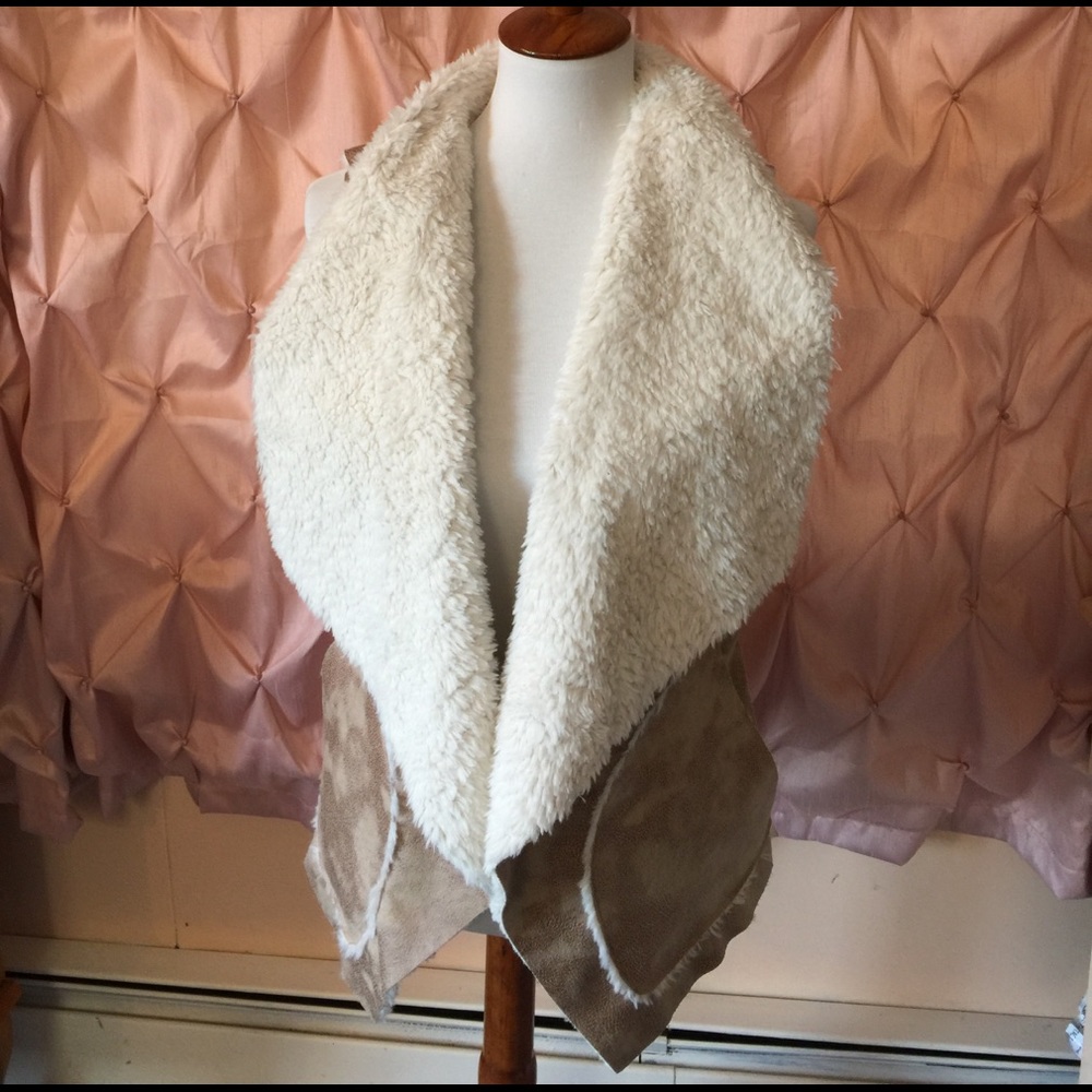 NWOT American rag snugly vest !