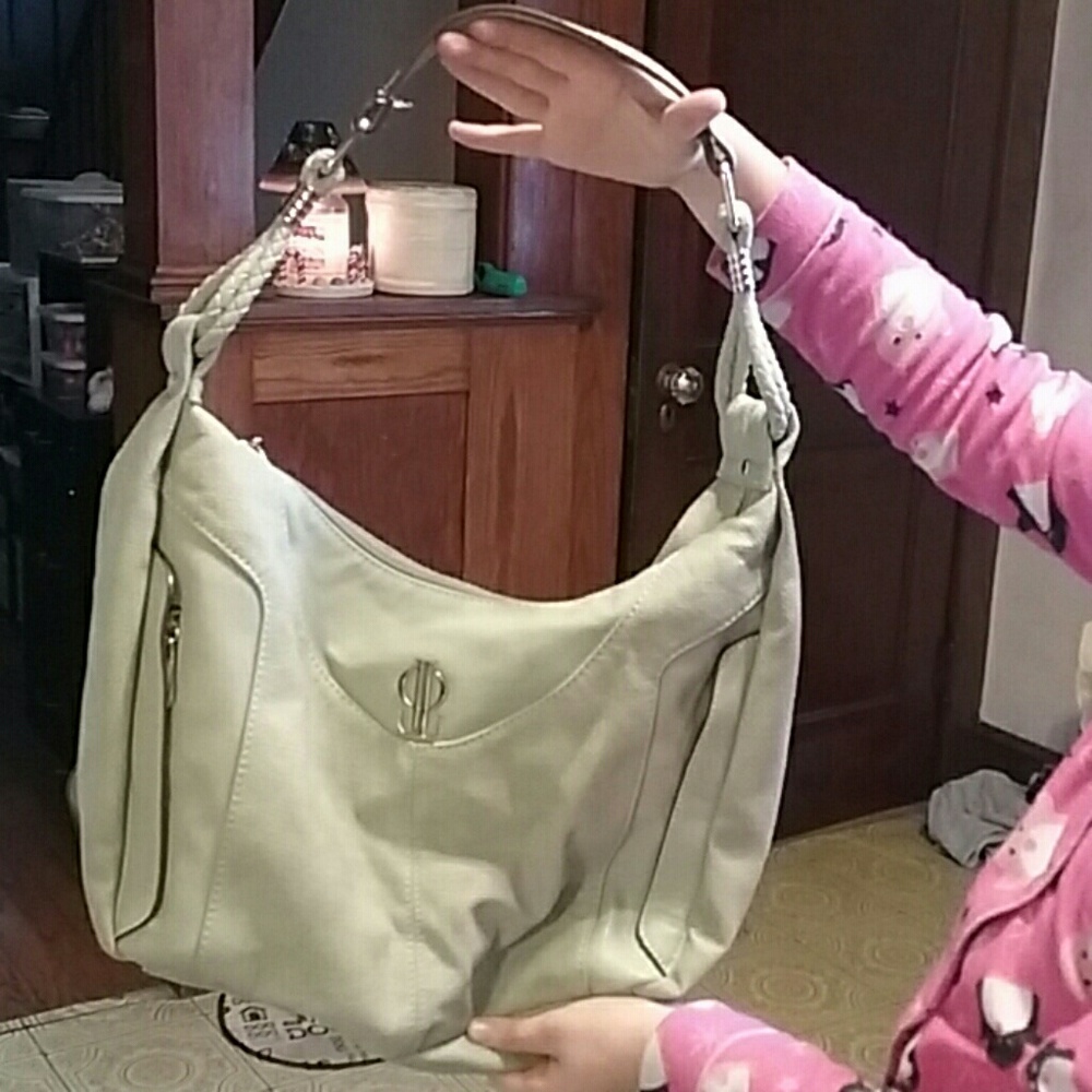 Light teal Jennifer Lopez handbag