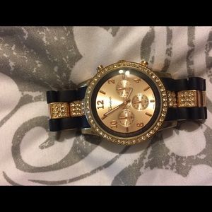 Rose gold and black watch