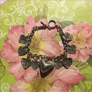 Sterling silver heart charm bracelet.