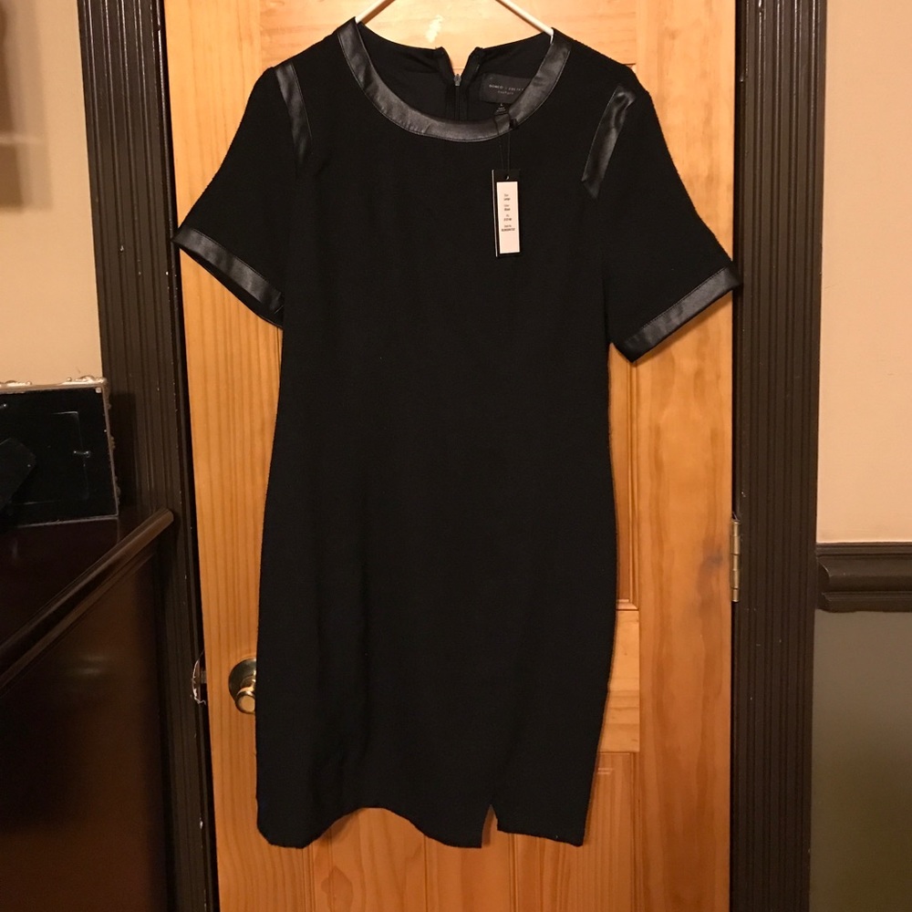 Black dress never worn leather trim