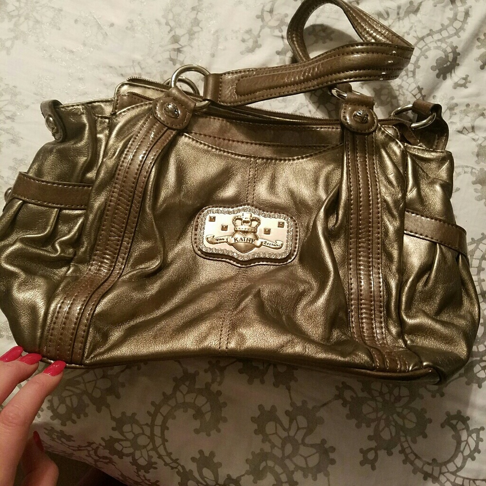 Metallic gold color Kathy Van Zeeland bag