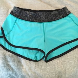 Teal and black Lululemon speed shorts