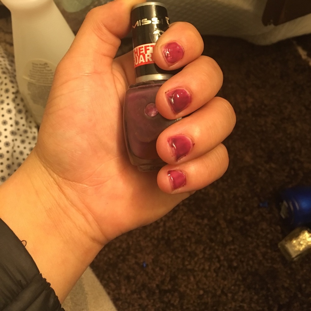 "Naughty" purple nail polish