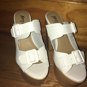 Nasty Gal platform heels with thick straps.