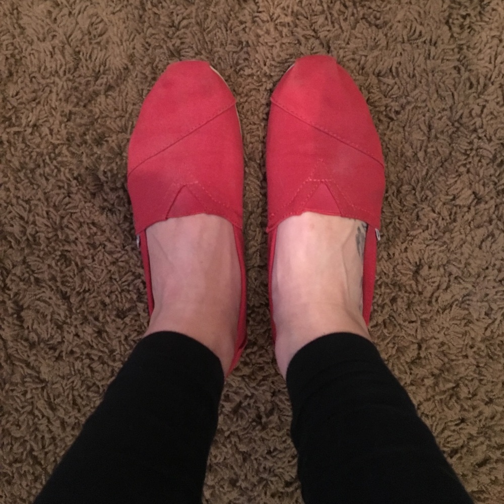 Red TOMS slip ons!