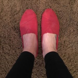Red TOMS slip ons!
