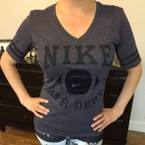 Nike purple t-shirt.