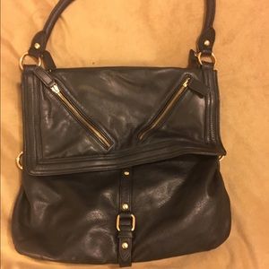 EUC UO genuine leather purse. Lots of pockets!