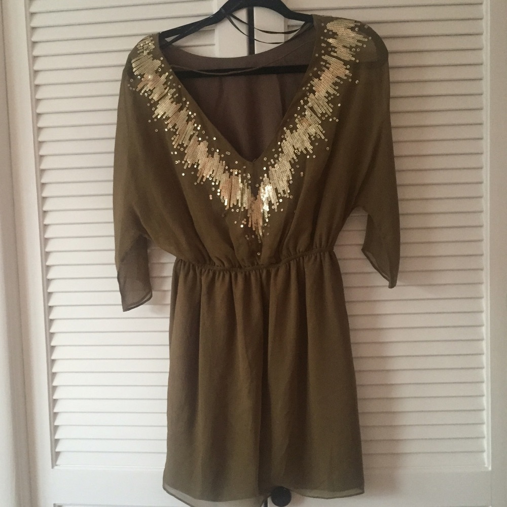 Green cocktail dress with gold sequin