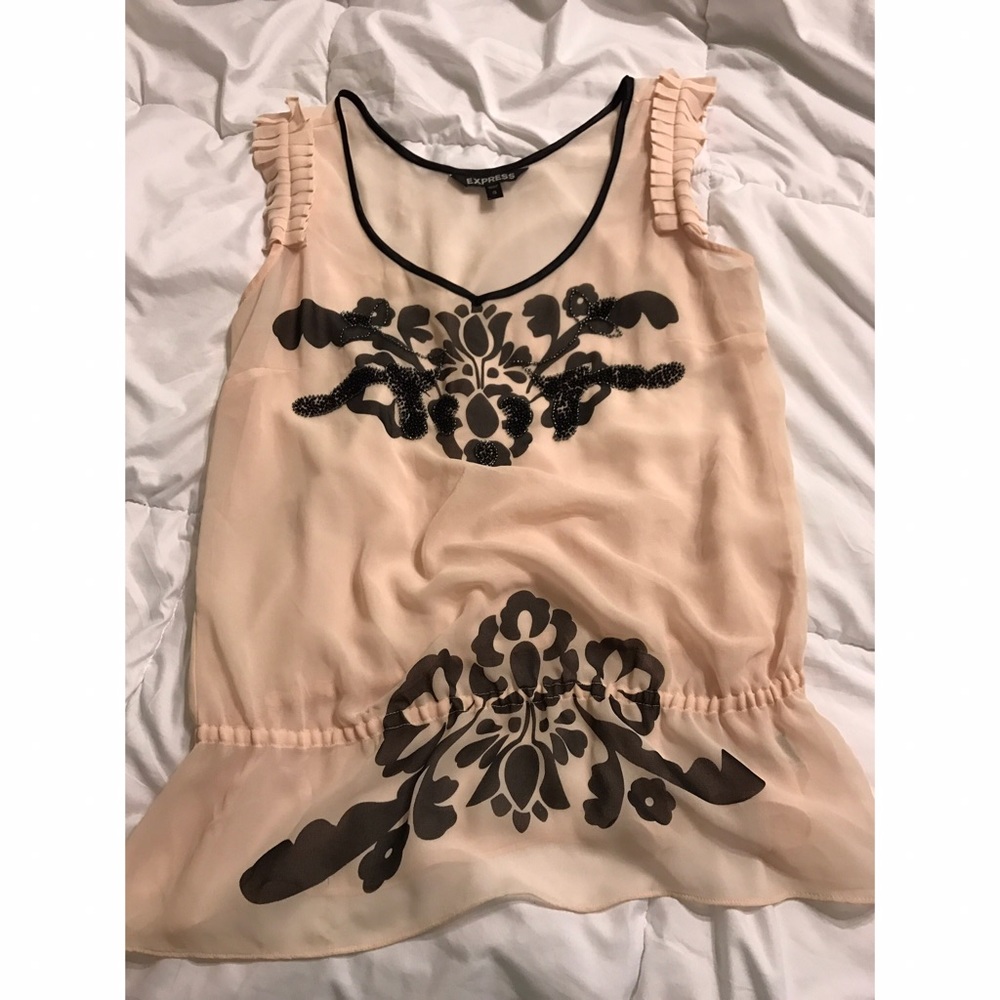 Sheer beaded pink top