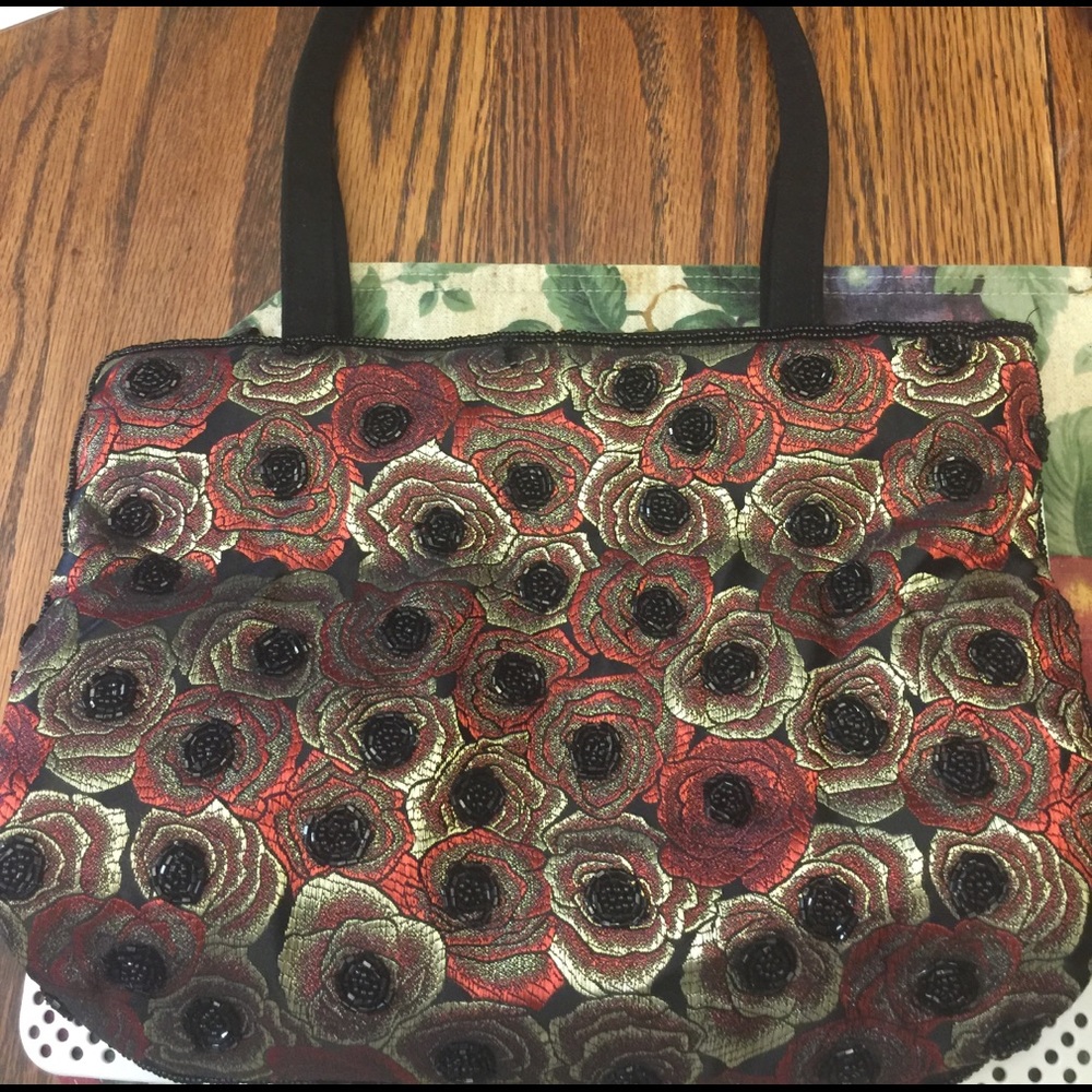 Beaded hand bag with roses design Silk fabric..