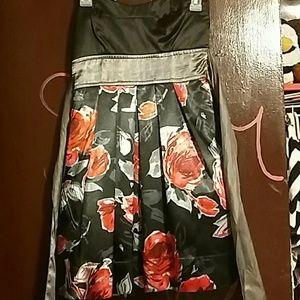 Strapless black and red dress with rose print