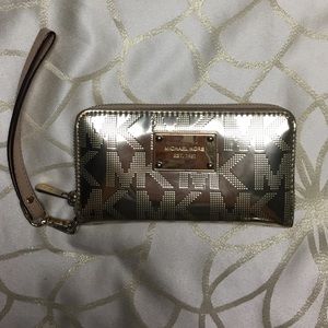 Metallic gold Michael Kors wristlet wallet