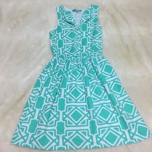 Green and white sleeveless dress