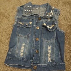 Distressed denim vest