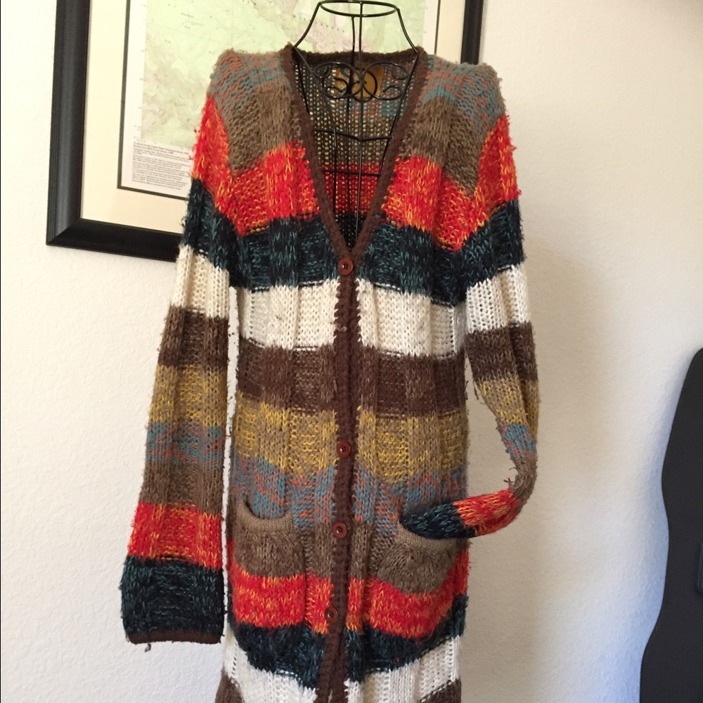 Knee-length multi-color sweater.