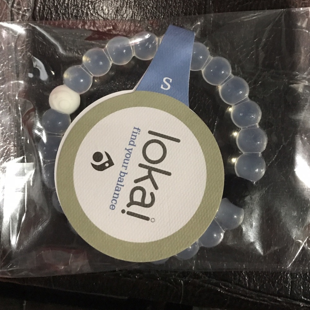 Brand new small clear Lokai
