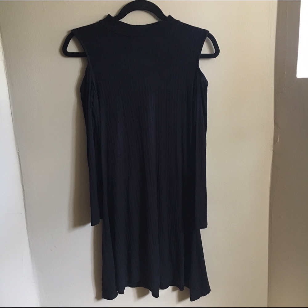 Black long sleeve mini dress with shoulder slits