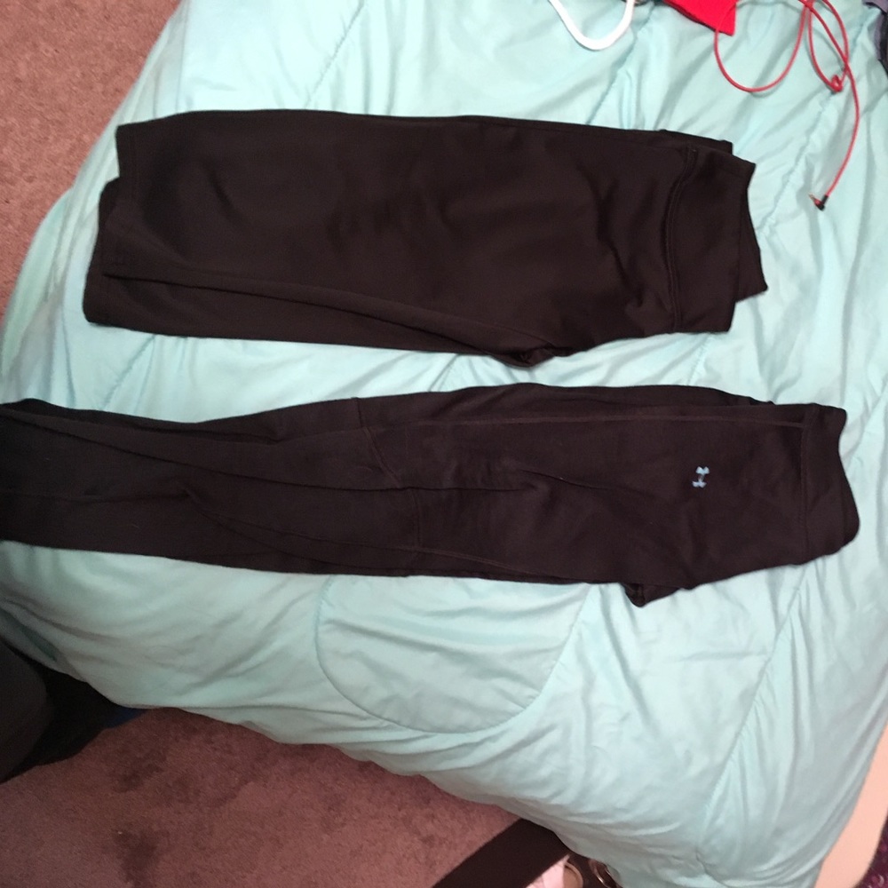 2 pairs of work out leggings. One is Under Armour