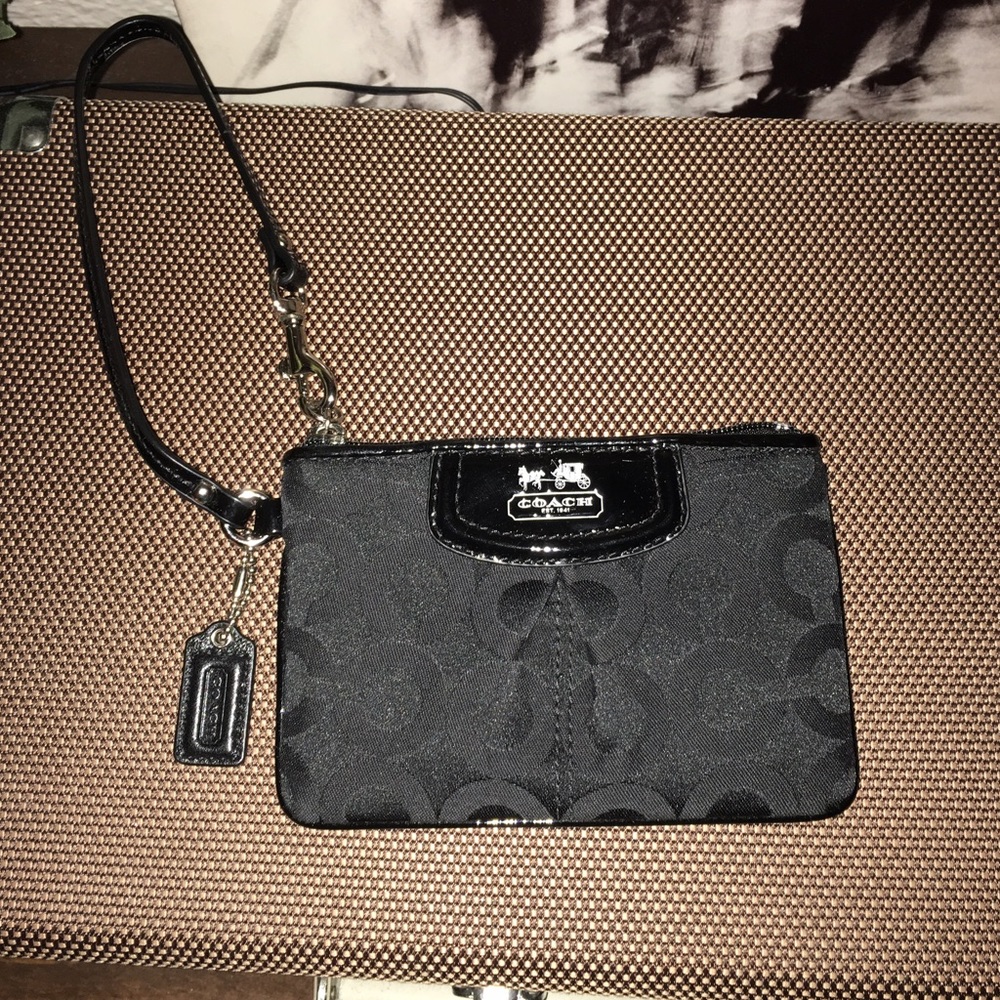 Brand new black Coach wristlet