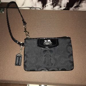 Brand new black Coach wristlet