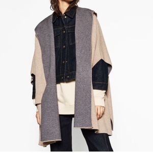 Cape coat with hood.New with tags.