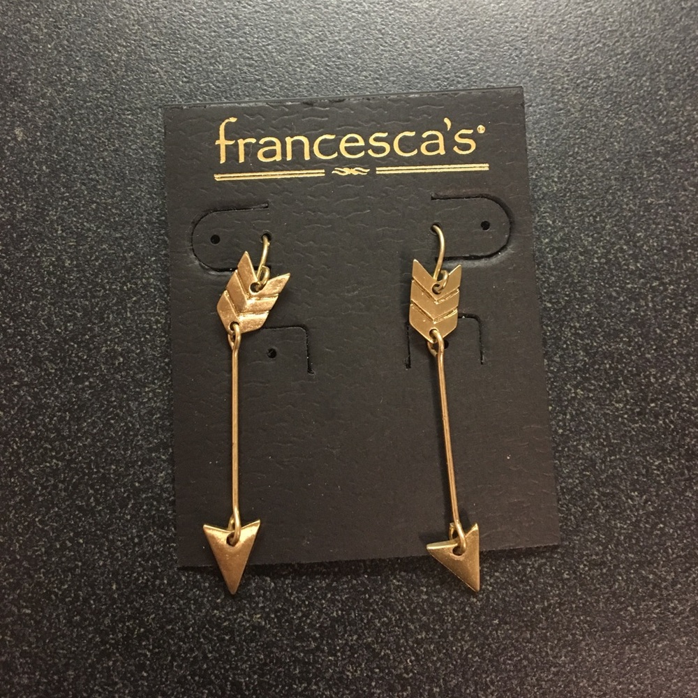 Never worn arrow earrings