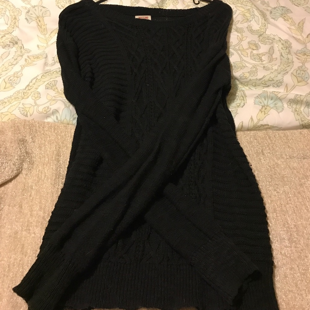 Black cable knit sweater.