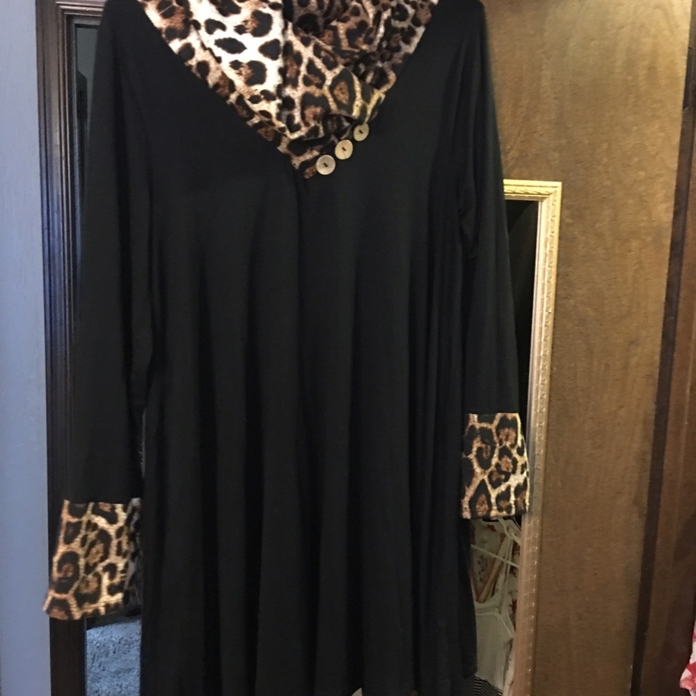 Black dress with leopard cowl neck