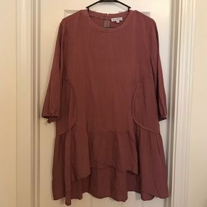 High-low mauve tunic with flared bottom. XL
