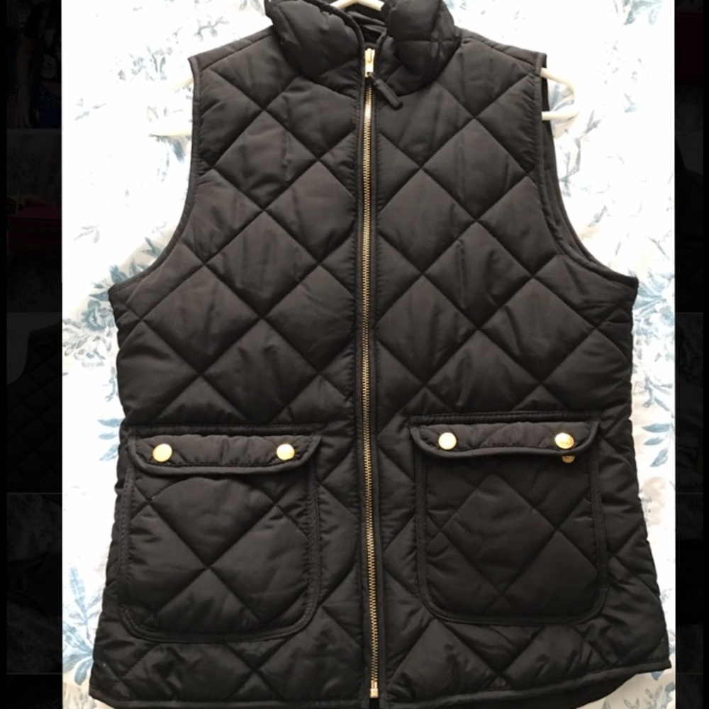 Black puffy vest